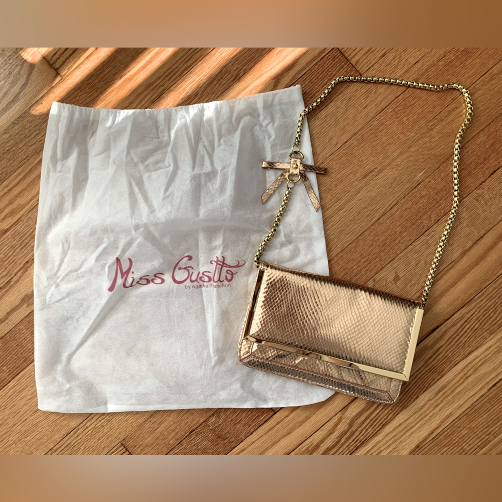 Rose Gold Miss Gustto Clutch with gold chain shoulder strap